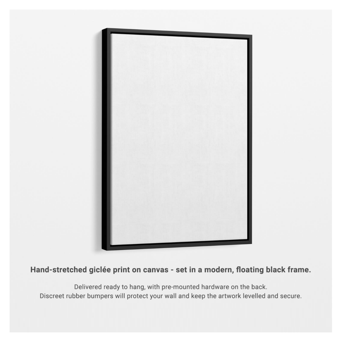 Black framed canvas print on a white wall with text describing the product.