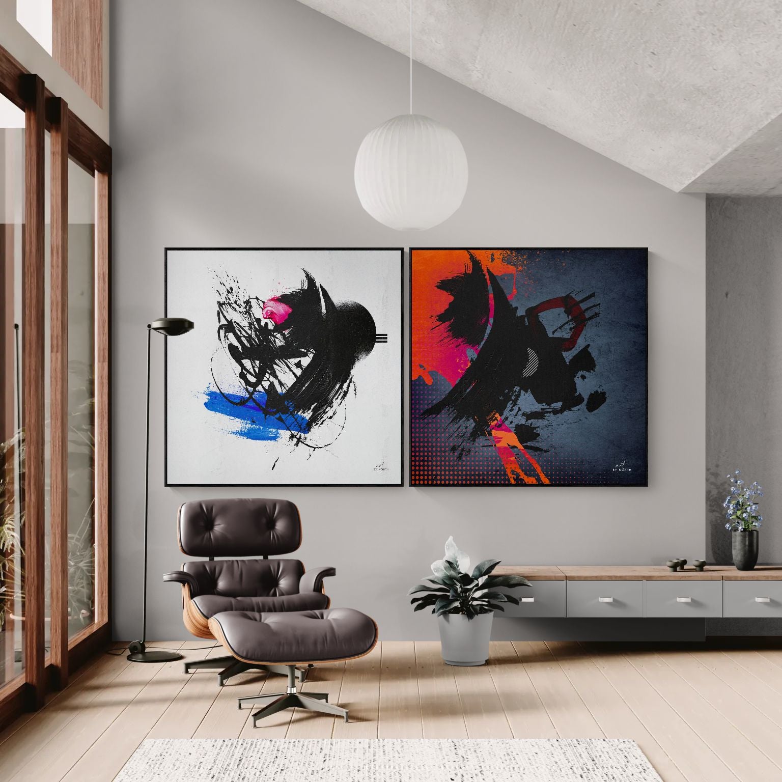 canvas prints styled above a chair on a light grey wall, creating a bold modern gallery wall.