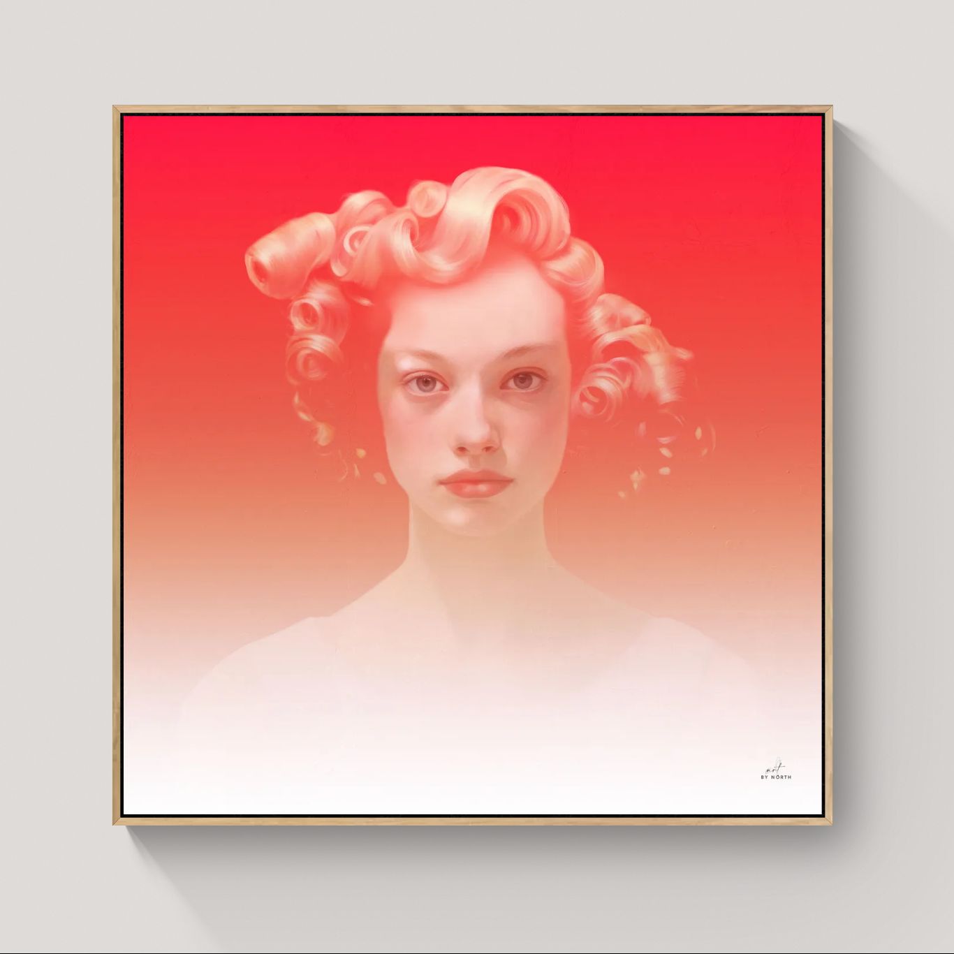 Framed artwork of a woman with styled hair on a gradient red and white background