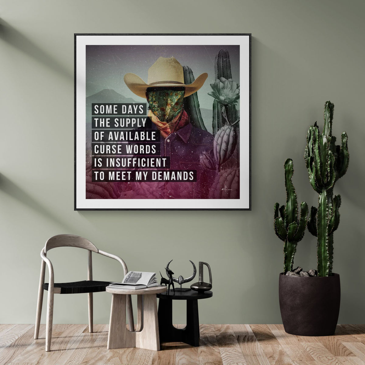 modern wall art with figurative portrait and text statement in contemporary lounge area