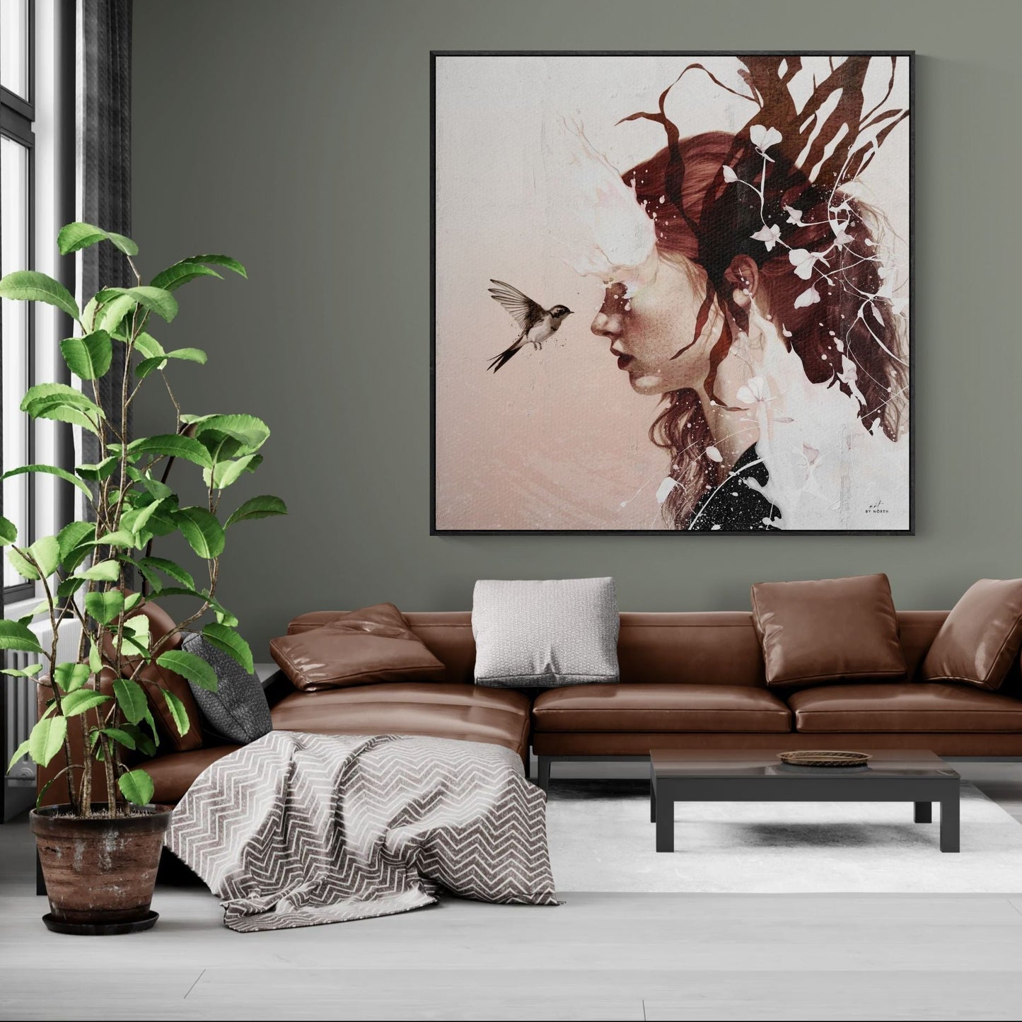 surreal figurative wall art with branches and blossoms in modern living space